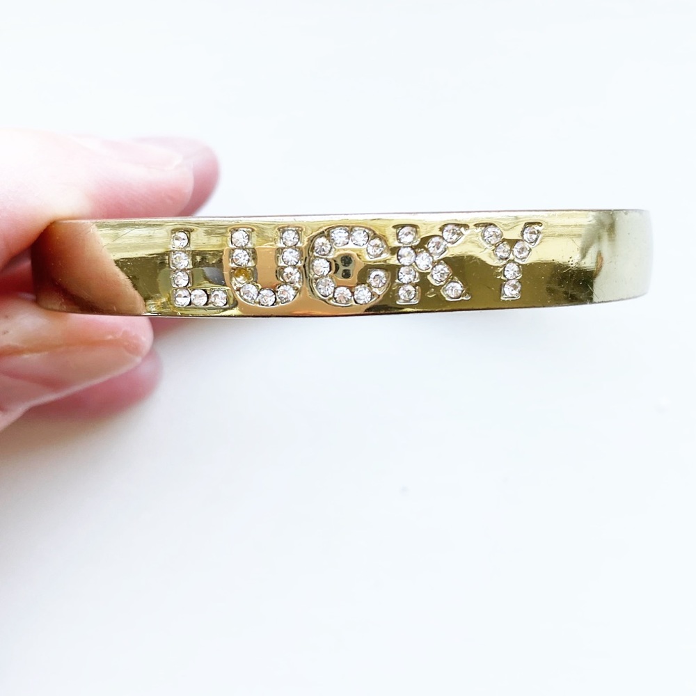 Gold & rhinestone “Lucky” bangle bracelet